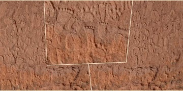 Engraving in Namibia shows detailed human and animal tracks carved in stone